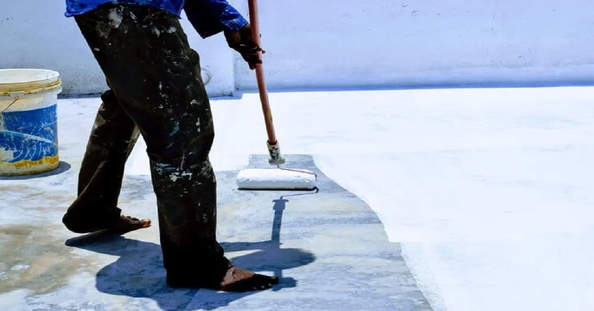 Waterproofing Contractors in Gurgaon applying protective coating on roof to prevent leakage and water damage